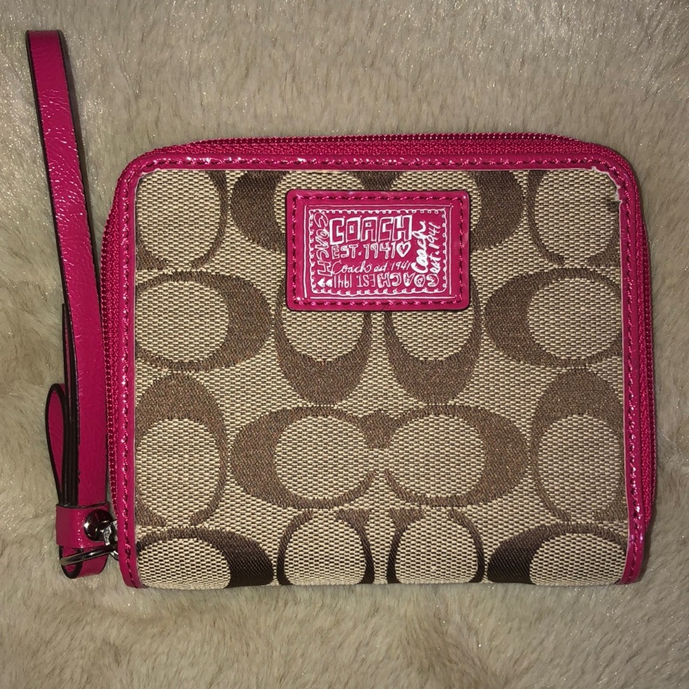 Tan and pink Coach wallet
